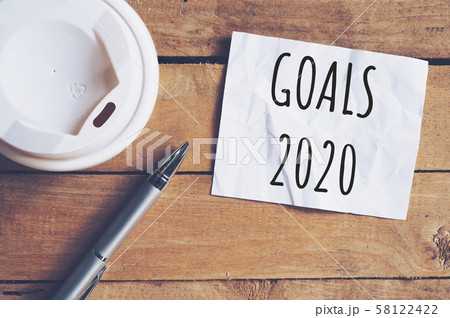 Goals for 2020 word on paper with pen and coffee 58122422
