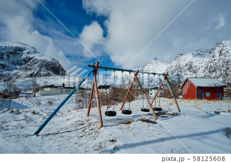 Children playground in winter. A village, Lofoten islands, Norway Children playground in winter. A village, Lofoten islands, Norway 58125608