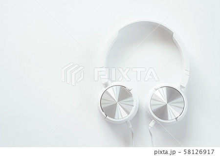 White earphones on white background isolate White earphones on white background isolate 58126917