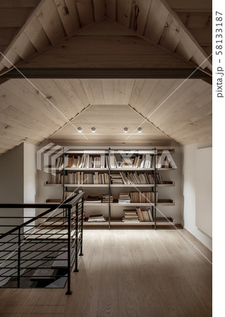 Light illuminated interior with sloping wooden ceiling Light illuminated interior with sloping wooden ceiling 58133187
