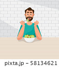 Man is eating salad. Vegetarian, healthy 58134621
