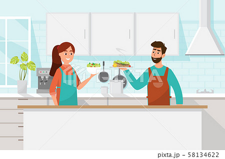 Husband and wife cooking together. Man and woman Husband and wife cooking together. Man and woman 58134622