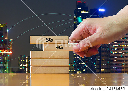 Close up hand picking domino 5G above 4G .That showing developed of best internet connection 5G is network connecting technology future global change from 4G to 5G system concept Close up hand picking domino 5G above 4G .That showing developed of best internet connection 5G is network connecting technology future global change from 4G to 5G system concept 58138686