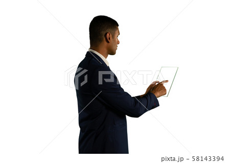 Businessman holding a transparent portable device 58143394