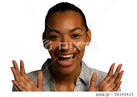 Smiling young businesswoman looking to camera Smiling young businesswoman looking to camera 58143415