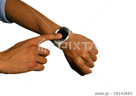Young man using a smartwatch Young man using a smartwatch 58143662