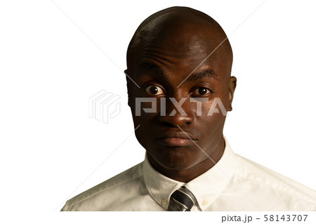 Young disappointed businessman looking to camera Young disappointed businessman looking to camera 58143707