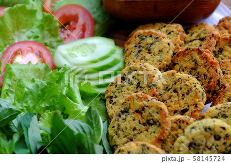 Close up Vietnamese vegan food, green bean pies with salad 58145724