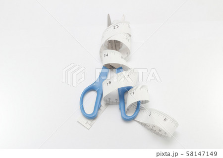 a tape of wrapped around a scissors 58147149