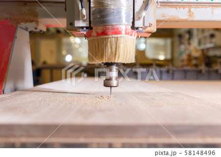 wood, metal, production concept - the cutting instrument, focus at the cutting process wood, metal, production concept - the cutting instrument, focus at the cutting process 58148496