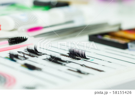 Various eyelash extension procedure tools. Beauty shop Various eyelash extension procedure tools. Beauty shop 58155426