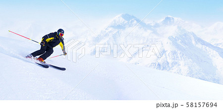 Skier in high mountains Skier in high mountains 58157694
