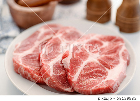 Raw fresh pork neck meat steaks 58159935