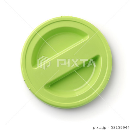 Top view of green round plastic lid Top view of green round plastic lid 58159944