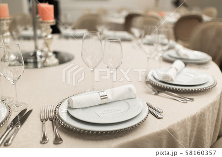 The white round banquet table in the restaurant is 58160357