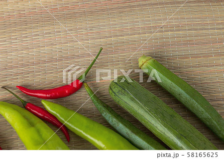 Fresh vegetables ready for cooking shot on rustic Fresh vegetables ready for cooking shot on rustic 58165625