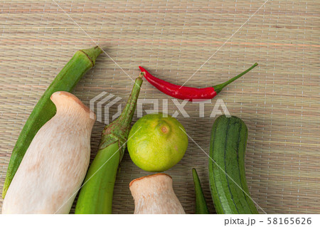 Fresh vegetables ready for cooking shot on rustic Fresh vegetables ready for cooking shot on rustic 58165626