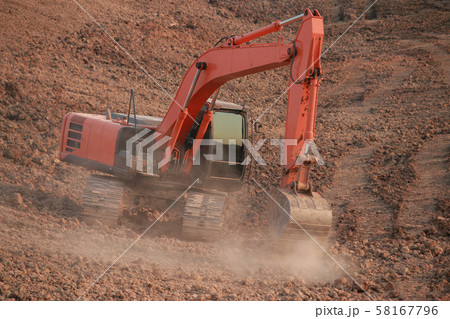 Orange excavator Under construction Large Orange excavator Under construction Large 58167796