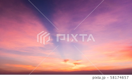 Beautiful view of sky and cloud at dusk,Sky Bright Blue Orange And Yellow Colors in twilight after sunset time. 58174657