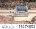 Sanitary sewer drainage system development in construction site.Concrete manholes construction for draining storm water. 58174658
