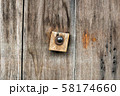 Rusty lock of old gates.Vintage door with metal handle. 58174660