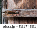 Rusty lock of old gates.Vintage door with metal handle. 58174661