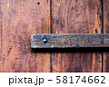 Rusty lock of old gates.Vintage door with metal handle. 58174662
