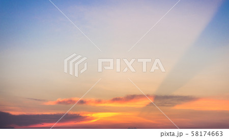 Beautiful view of sky and cloud at dusk,Sky Bright Blue Orange And Yellow Colors in twilight after sunset time. 58174663