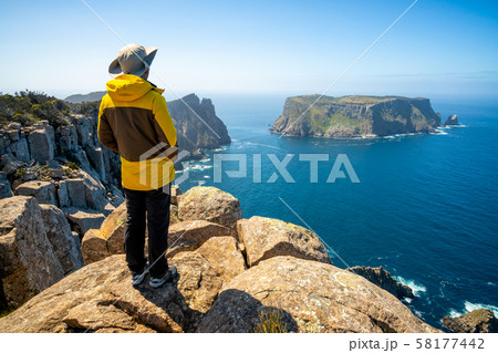 Trekking in Tasman Peninsula, Tasmania, Australia. 58177442