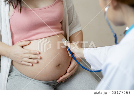 Pregnant Woman and Gynecologist Doctor at Hospital 58177563