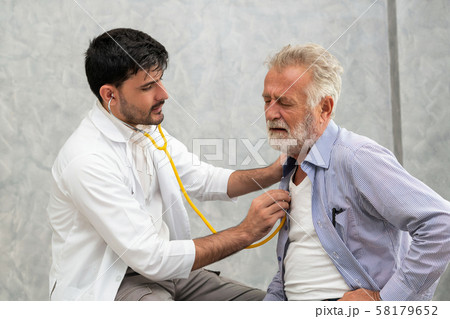 Senior patient visits doctor at the hospital. Senior patient visits doctor at the hospital. 58179652