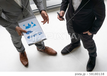 Businessmen are in business meeting in office. Businessmen are in business meeting in office. 58180138