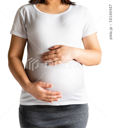 Happy pregnant woman isolated on white background. Happy pregnant woman isolated on white background. 58180487