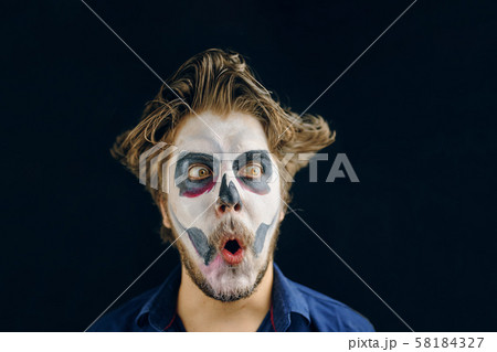 Masked man of the day of death on Halloween Masked man of the day of death on Halloween 58184327