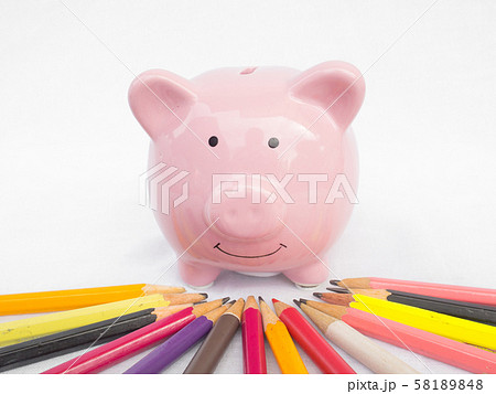 Pink piggy bank with Bright colored pencils, Saving money for future plan and retirement fund concept 58189848