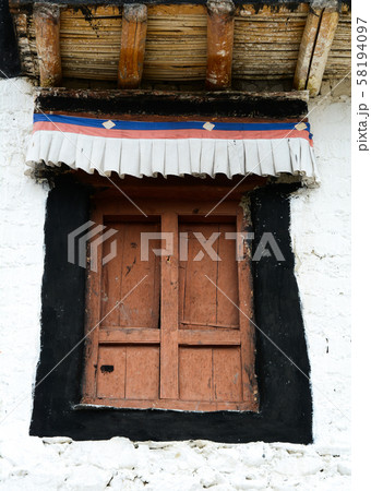 Wooden door of ancient temple Wooden door of ancient temple 58194097