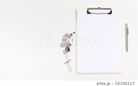 Office clipboard with white sheet of paper for advertisement Office clipboard with white sheet of paper for advertisement 58198327