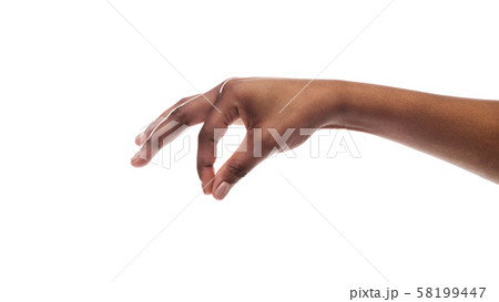 Female hand picking up small items isolated on white background Female hand picking up small items isolated on white background 58199447