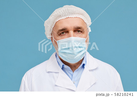 Mature doctor in mask 58210241