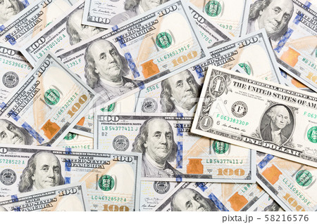 1 dollar bill on various US Dollar billss Top view 58216576