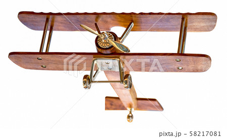 Wooden airplane model takeoff bottom view isolated Wooden airplane model takeoff bottom view isolated 58217081