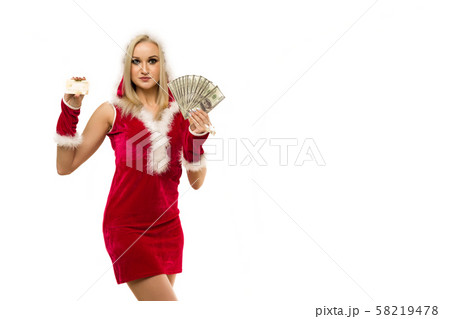 A beautiful sexy woman in a New Year's dress, hold 58219478