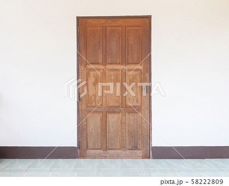 Old wood door on white wall. Old wood door on white wall. 58222809