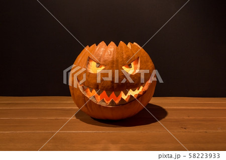 Spooky halloween pumpkin alone dark twilight night Spooky halloween pumpkin alone dark twilight night 58223933