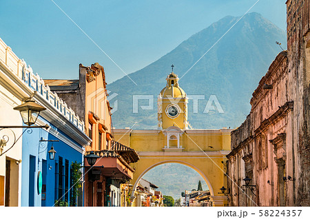 Arco de Santa Catalina and Volcan de Agua in Antigua Guatemala, Central America 58224357