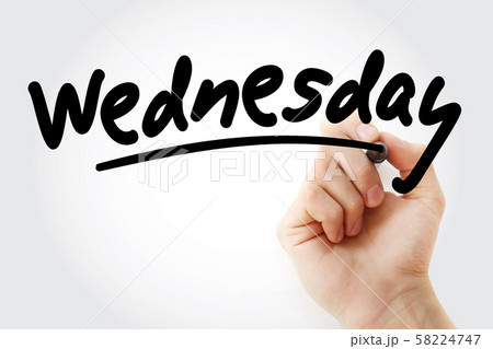 Hand writing Wednesday with marker 58224747