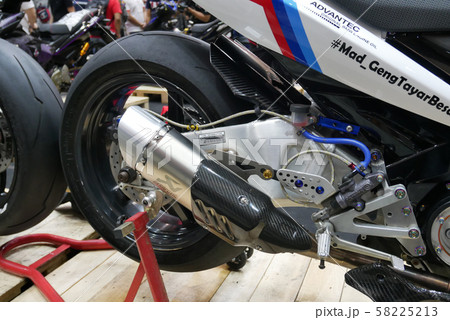 Selective focused of custom exhaust system at the motorcycle. Designed by 3rd party manufacturer to give different experience to the rider. Selective focused of custom exhaust system at the motorcycle. Designed by 3rd party manufacturer to give different experience to the rider. 58225213