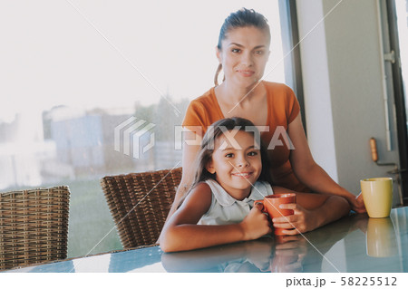 Pleasant mother enjoying time with her pretty daughter 58225512