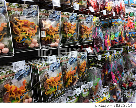 Children's toys are hung and exhibited to customers. Good design packaging. Sorted by type and labelled with a price. 58225514