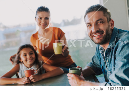 Loving handsome husband resting with his family 58225521